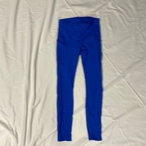Lululemon blue leggings with side pockets, size 4